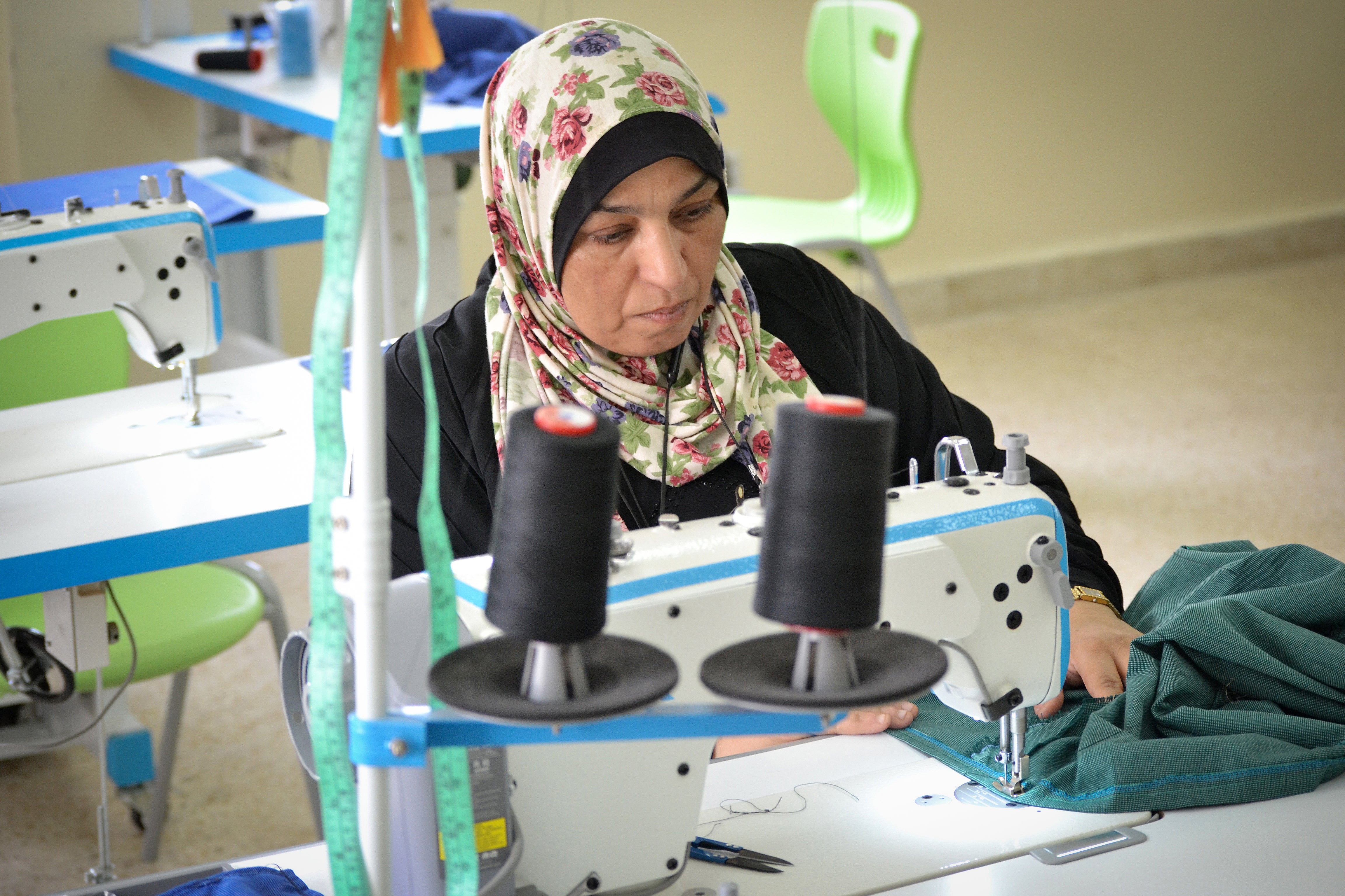 Abeer Abu-Rizeq during a sewing class at the UN Women Madaba Oasis Centre. Photo: UN Women/Bashar Al-Jabari