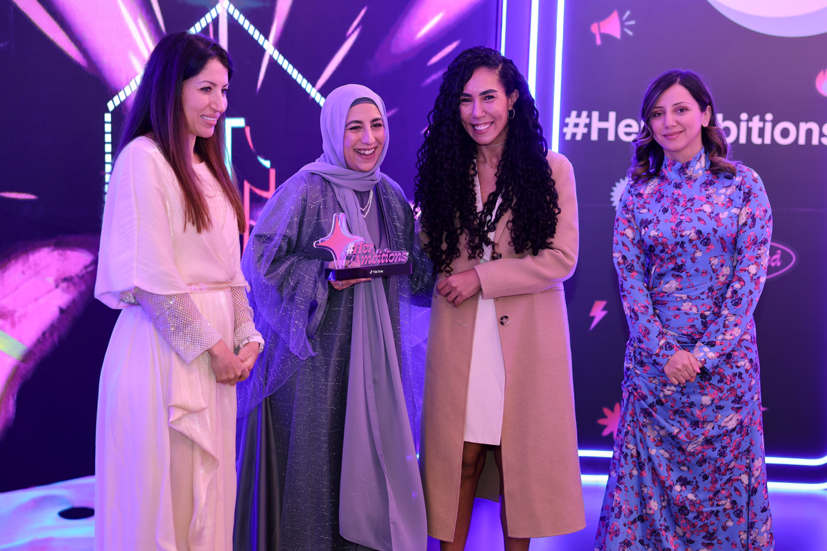 Second prize winner, Heba Qadeer accepting her awards from TikTok at #HerAmbitions awards ceremony.