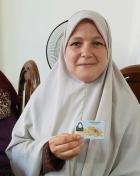 Asmaa Emam at her home after receiving her national ID card. Photo: Courtesy of Asmaa Emam